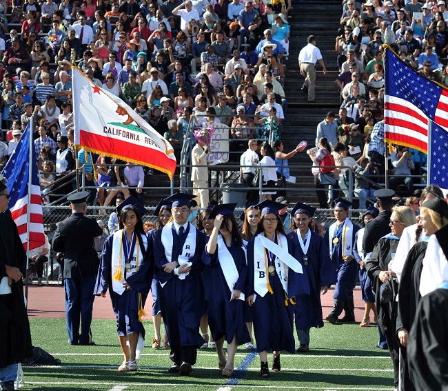 Students receive their diplomas during the 48th Commencement Exercises at John A. Rowland High School in Rowland Heights on Thursday.