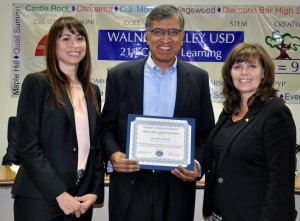 Diamond Bar High School parent volunteer George Ganesh was recognized with the Partner in Education Award. Shown with Board President Cindy Ruiz and Principal Catherine Real.