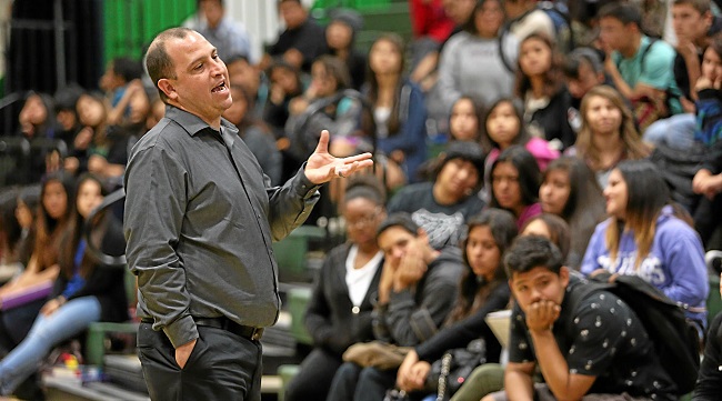 US History teacher Devon Darrow talks to students at Nogales High School. 