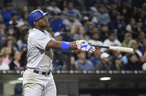 Yasiel Puig watches his fifth home run of the season leave Petco Park on Friday in San Diego. (Getty Images)
