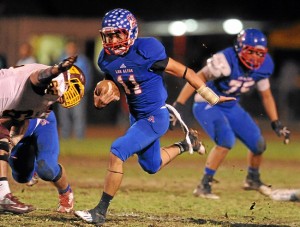 Los Altos High players scrambles for a first down. 