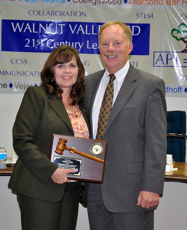 Outgoing Board President Cindy Ruiz was honored for her outstanding service during the December 11 re-organization meeting. Shown with newly elected Board President Larry Redinger. 