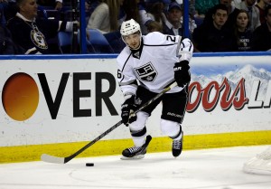 "Los Angeles Kings' Slava Voynov, of Russia, handles the puck during the second period in Game 5 of a first-round NHL hockey Stanley Cup playoff series against the St. Louis Blues, Wednesday, May 8, 2013, in St. Louis. (AP Photo/Jeff Roberson)"