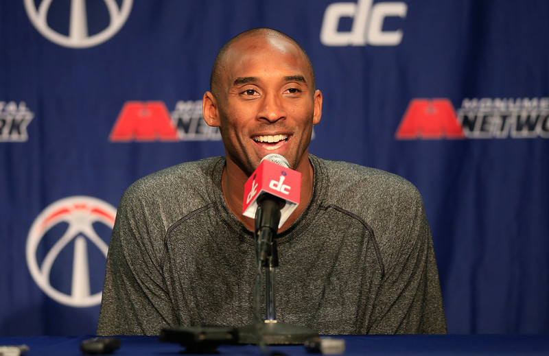 Kobe Bryant #24 of the Los Angeles Lakers talks with the media during a news conference before the start of the Lakers and Washington Wizards game at Verizon Center on November 26, 2013 in Washington, DC. (Photo by Rob Carr/Getty Images)