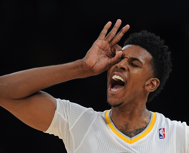 The Lakers’ Nick Young #0 reacts after sinking a 3-point shot during their game against the Heat at the Staples Center December 25, 2013. The Heat beat the Lakers 101-95. (Photo by Hans Gutknecht/Los Angeles Daily News)