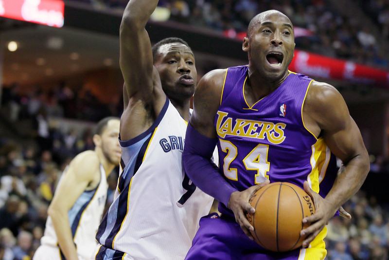 Memphis Grizzlies' Tony Allen (9) defends Los Angeles Lakers' Kobe Bryant (24) during the first half of an NBA basketball game in Memphis, Tenn., Tuesday, Dec. 17, 2013. (AP Photo/Danny Johnston)