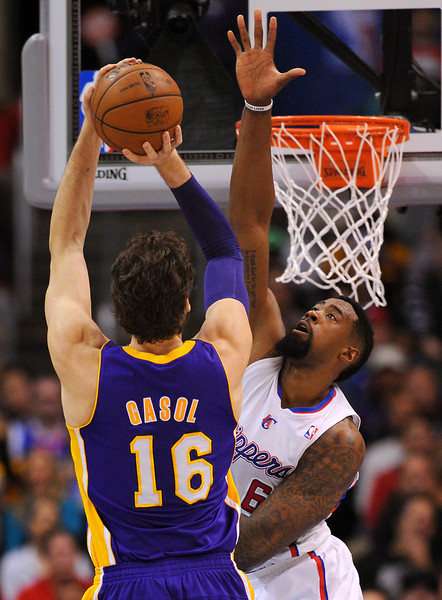 The Lakers' Pau Gasol shoots against the Clippers' DeAndre Jordan in the first half, Friday, January 10, 2014, at Staples Center. (Photo by Michael Owen Baker/L.A. Daily News)