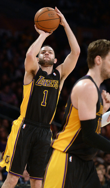 The Lakers’ Jordan Farmar #1 shoots during their game against the Kings at the Staples Center in Los Angeles February 28, 2014. (Photo by Hans Gutknecht/Los Angeles Daily News)
