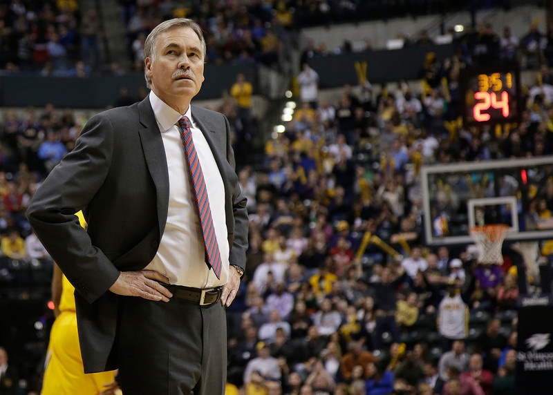 Los Angeles Lakers head coach Mike D'Antoni looks in the direction of the scoreboard while playing the Indiana Pacers during the second half of an NBA basketball game in Indianapolis, Tuesday, Feb. 25, 2014. The Pacers won 118-98. (A