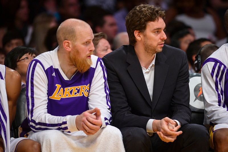 LakersÕ Chris Kaman and Pau Gasol watch the game during second half action at Staples Center Sunday, March 30, 2014.  Chris Kaman scored 28 points as the Lakers defeated the Suns 115-99.  ( Photo by David Crane/Los Angeles Daily News )