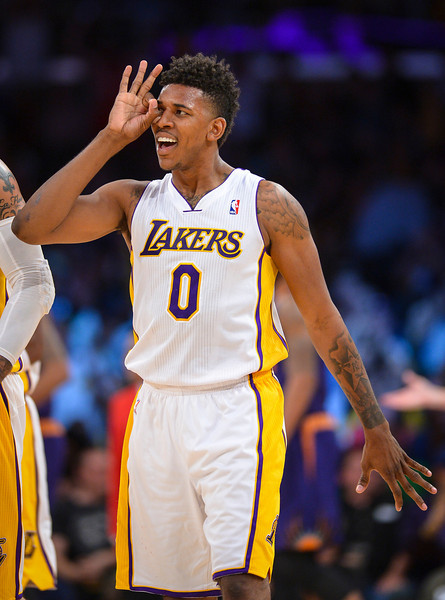 Lakers' Nick Young thought he had a three point shot at the end of the third period, but it was called back during second half action at Staples Center Sunday, March 30, 2014.  Lakers defeated the Suns 115-99.  ( Photo by David Crane/Los Angeles Dail