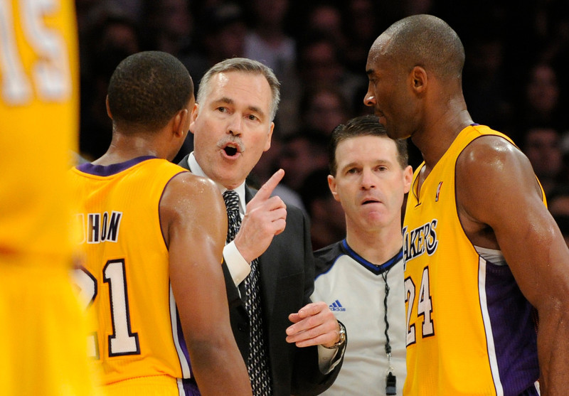 Mike D'Antoni gives some instruction in the final seconds to Chris Duhon and Kobe Bryant. The Lakers defeated the Brooklyn Nets 95-90 in a game played at Staples Center in Los Angeles, CA. The game was new coach Mike D'Antoni's first victory as a Laker. 11/20/12 (photos by John McCoy/Staff Photographer)