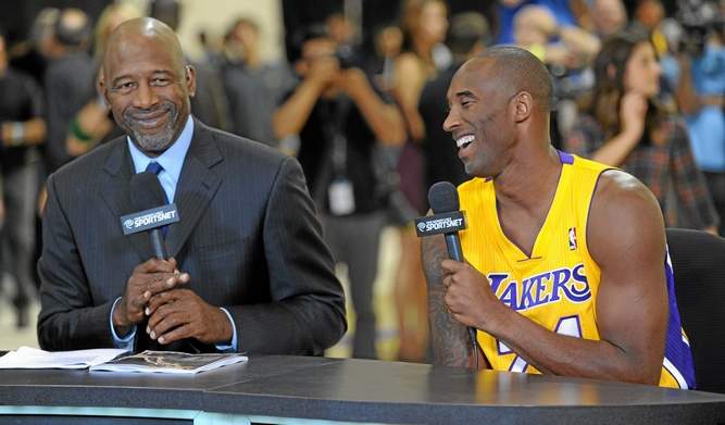 Former Laker James Worthy, left, shown with Kobe Bryant during a recent media day, believes Bryant can play past his current contract. Photo credit: John McCoy / Staff Photographer 