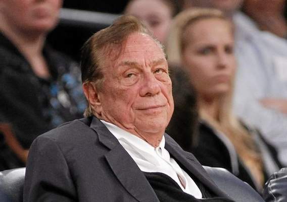 FILE - In this Dec. 19, 2011 file photo, Los Angeles Clippers owner Donald Sterling watches the Clippers play the Los Angeles Lakers during an NBA preseason basketball game in Los Angeles. Los Angeles Clippers owner Donald Sterling responded to the NBA's attempt to oust him on Tuesday, May 27, 2014, arguing that there is no basis for stripping him of his team because his racist statements were illegally recorded "during an inflamed lovers' quarrel in which he was clearly distraught." (AP Photo/Danny Moloshok, File) 