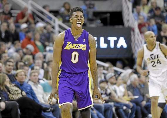 SoCal native Nick Young is expected to opt out of his contract with the Lakers but would very much like to return to the team with better deal. Rick Bowmer — The Associated Press