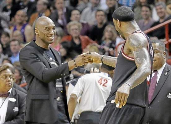 LeBron James, right, said watching Kobe Bryant, left, recently has made him think about his longevity. "Absolutely," James said. (Alan Diaz/The Associated Press) 
