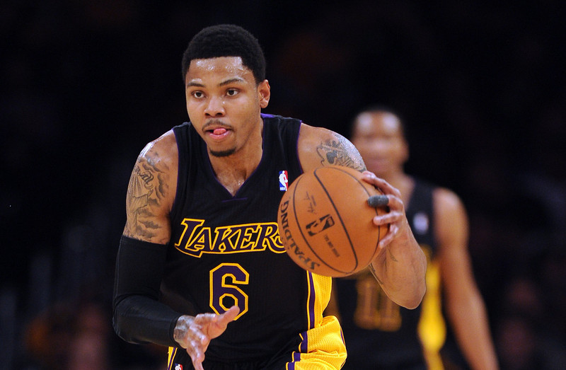The Lakers’ Kent Bazemore #6 moves the ball up court during their game against the Kings at the Staples Center in Los Angeles February 28, 2014. (Photo by Hans Gutknecht/Los Angeles Daily News)