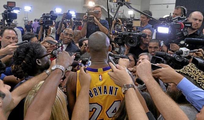 Kobe Bryant is surrounded by the media as the Lakers host their annual Media Day in El Segundo. Thomas R. Cordova—staff photographer