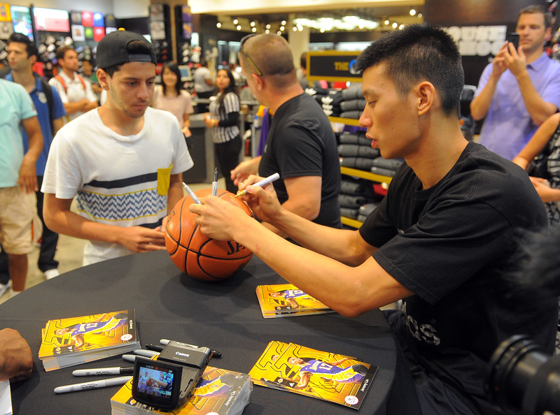 "New Los Angeles Lakers player Jeremy Lin signs autographs for fans at a shoe store in Culver City, CA on Thursday, September 25, 2014. (Photo by Scott Varley, Daily Breeze) "