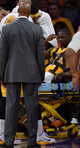 "Lakers#30 Julius Randle broke his leg on a play in the 4th quarter. The Lakers played the Houston Rockets in the opening game of the 2014-2015 Season.  Los Angeles, CA. 10/28/2014 (Photo by John McCoy Daily News )"