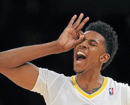 The Lakers' Nick Young reacts after sinking a 3-point shot during their game against the Heat at the Staples Center December 25, 2013. The Heat beat the Lakers 101-95. (Photo by Hans Gutknecht/Los Angeles Daily News) 