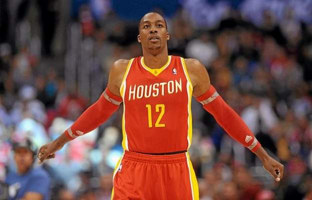 Houston’s Dwight Howard walked away from the Lakers as a free agent after last season, but returns to face them tonight. ANDY HOLMZMAN — STAFF PHOTOGRAPHER