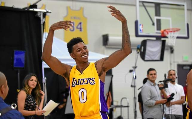 Nick Young reacts to seeing the crowd around teammate Kobe Bryant on media day in El Segundo, Calif., on Sep. 29, 2014. The Lakers open their season on Oct. 29 against the Houston Rockets. (FREDERIC J. BROWN/AFP/Getty Images file) 