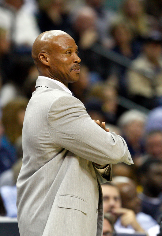 "Los Angeles Lakers Head Coach Byron Scott studies the action in the second half of an NBA basketball game against the Memphis Grizzlies Tuesday, Nov. 11, 2014, in Memphis, Tenn. (AP Photo/Karen Pulfer Focht)"