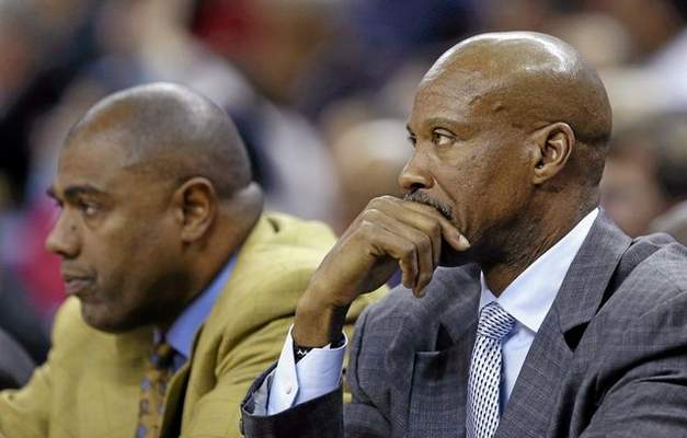 Los Angeles Lakers coach Byron Scott, sitting next to assistant coach Paul Pressey during the Lakers 109-102 loss to New Orleans, said he would like to talk to Steve Nash, but the point guard hasn’t returned his call. (AP Photo/Gerald Herbert) 