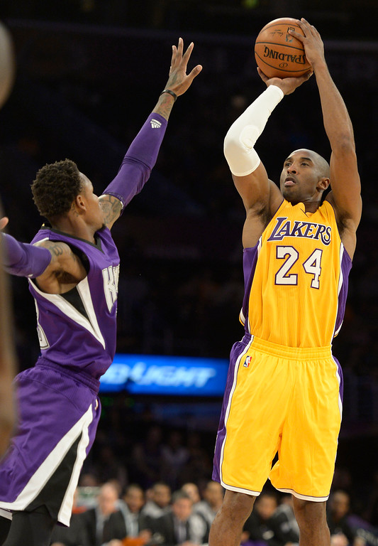 "Kobe Bryant shoots over Ben McLemore in the first half. The Los Angeles Lakers played the Sacramento Kings in Los Angeles, CA. December 9, 2014. (Photo by John McCoy Daily News)"
