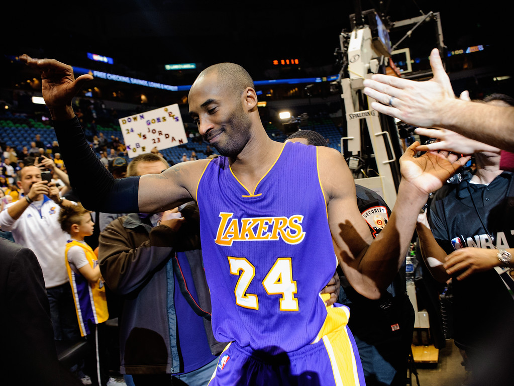"MINNEAPOLIS, MN - DECEMBER 14: Kobe Bryant #24 of the Los Angeles Lakers leaves the court after the game against the Minnesota Timberwolves on December 14, 2014 at Target Center in Minneapolis, Minnesota. Bryant passed Michael Jordan on the all-time scoring list with a free throw during the second quarter. The Lakers defeated the Timberwolves 100-94. NOTE TO USER: User expressly acknowledges and agrees that, by downloading and or using this Photograph, user is consenting to the terms and conditions of the Getty Images License Agreement. (Photo by Hannah Foslien/Getty Images)"
