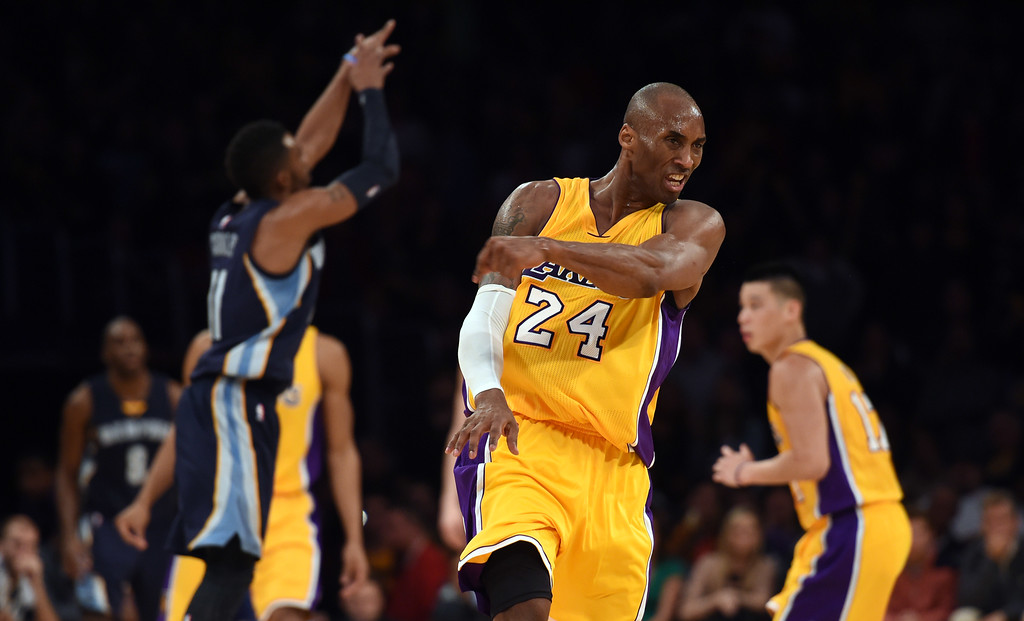 "The Lakers’ Kobe Bryant #24 reacts after fouling the Grizzlies’  Mike Conley #11 late in the 4th quarter during their NBA game at the Staples Center Friday, January 2, 2015.  The Grizzlies beat the Lakers 109-106. (Photo by Hans Gutknecht/Los Angeles Daily News)"