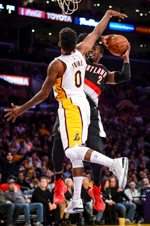 "Lakers' Nick Young fouls Portland's Wesley Matthews during second half action at Staples Center Sunday, January 11, 2015.  Portland defeated the Lakers 106-94. ( Photo by David Crane/Los Angeles Daily News ) "