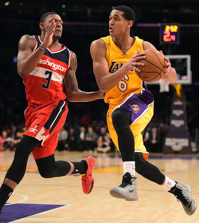 Jordan Clarkson of the Los Angeles Lakers tries to get around Bradley Beal of the Washington Wizards during their game January 27, 2015 at the Staples Center in Los Angeles, CA.(Andy Holzman/Los Angeles Daily News) 
