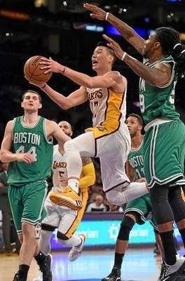 Los Angeles Laker Jeremy Lin,17, drives for a basket during the fourth quarter agains the Celtics. (Photo by Stephen Carr/Daily Breeze) 