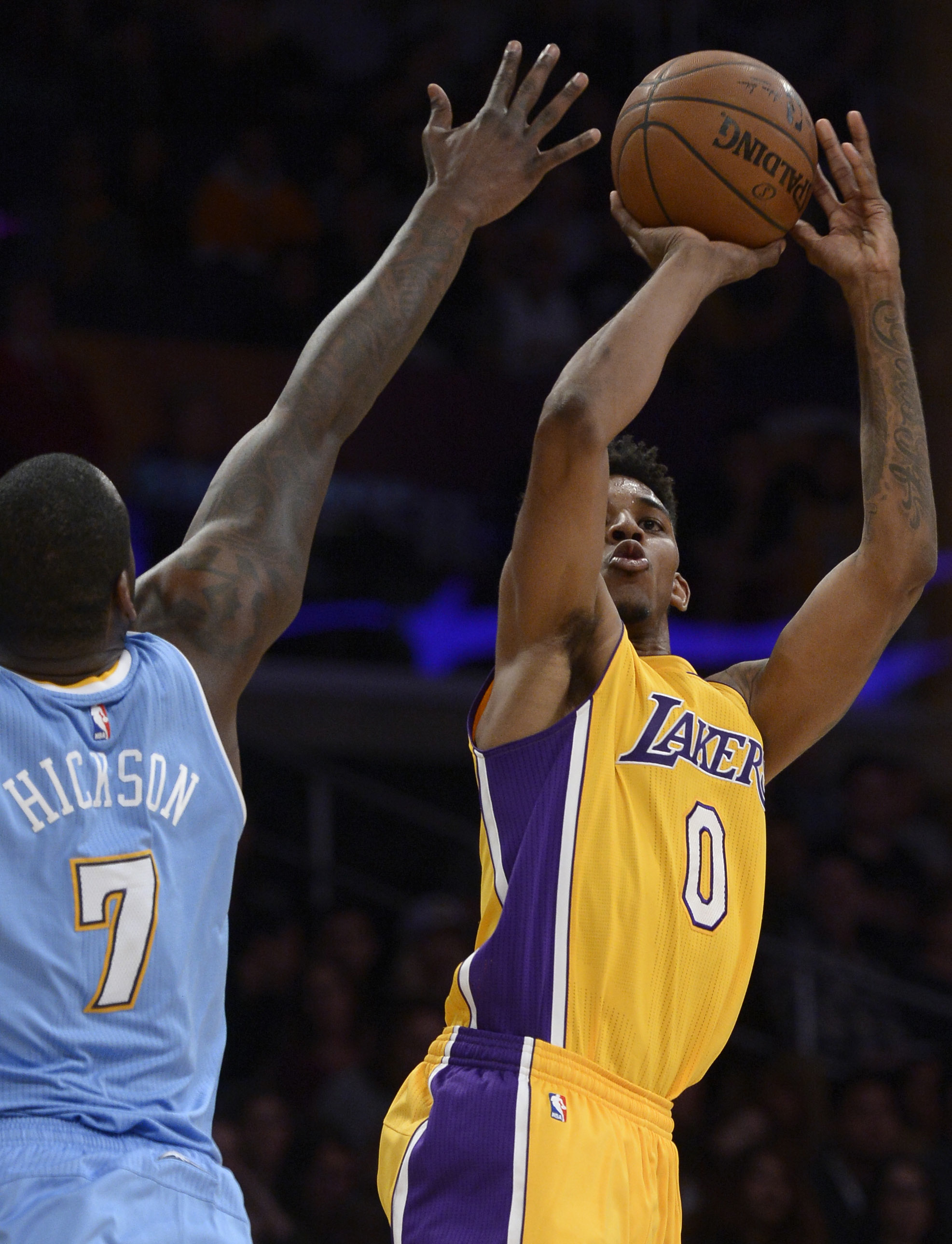 Lakers#0 Nick Young shoots over Nuggets#7 J.J. Hickson in the 4th quarter. The Denver Nuggets defeated the Los Angeles Lakers 106-96 at Staples Center in Los Angeles, CA February 10, 2015.  (Photos by John McCoy / Los Angeles Daily News)