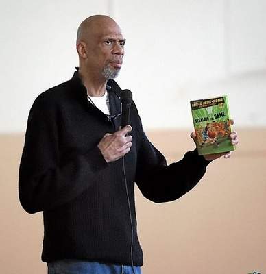 NBA legend Kareem Abdul-Jabbar speaks to students at Branciforte Middle School in Santa Cruz about his new book, 'Stealing the Game,' written for pre-teen kids. (Photo by Dan Coyro/Santa Cruz Sentinel) 