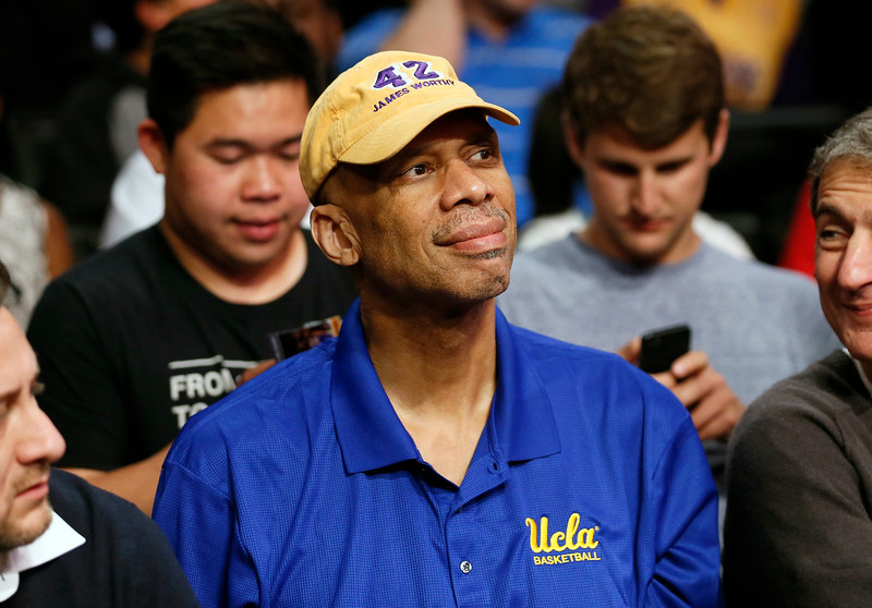 "FILE - This April 1, 2014,  file photo shows former Los Angeles Lakers player Kareem Abdul-Jabbar at an NBA basketball ball game in Los Angeles. Abdul-Jabbar is recovering after undergoing quadruple coronary bypass surgery. A hospital statement on Friday, April 17, 2015 says Abdul-Jabbar had the surgery on Thursday at Ronald Reagan UCLA Medical Center. The doctor who performed the surgery, says the 68-year-old former NBA and UCLA star is expected to make a full recovery.((AP Photo/Danny Moloshok,File)"