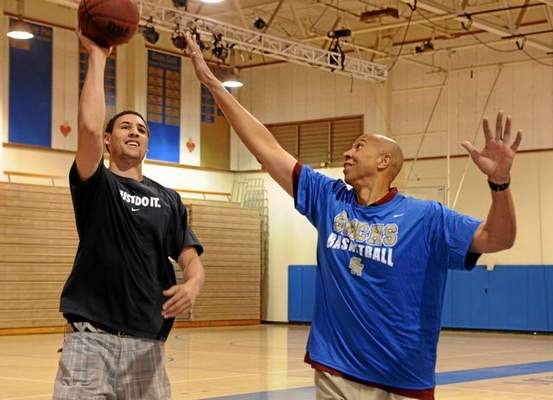 Mychal Thompson, right, plays basketball with his son, Klay Thompson, left, of the Golden State Warriors on June 4, 2013. Klay Thompson recently agreed to a four-year contract extension that will likely be worth around $70 million with the Warriors. Mychal Thompson, a key role player during the Lakers’ Showtime heyday, is currently an analyst for Lakers radio broadcasts on KSPN 710-AM. (File photo/Daily Breeze