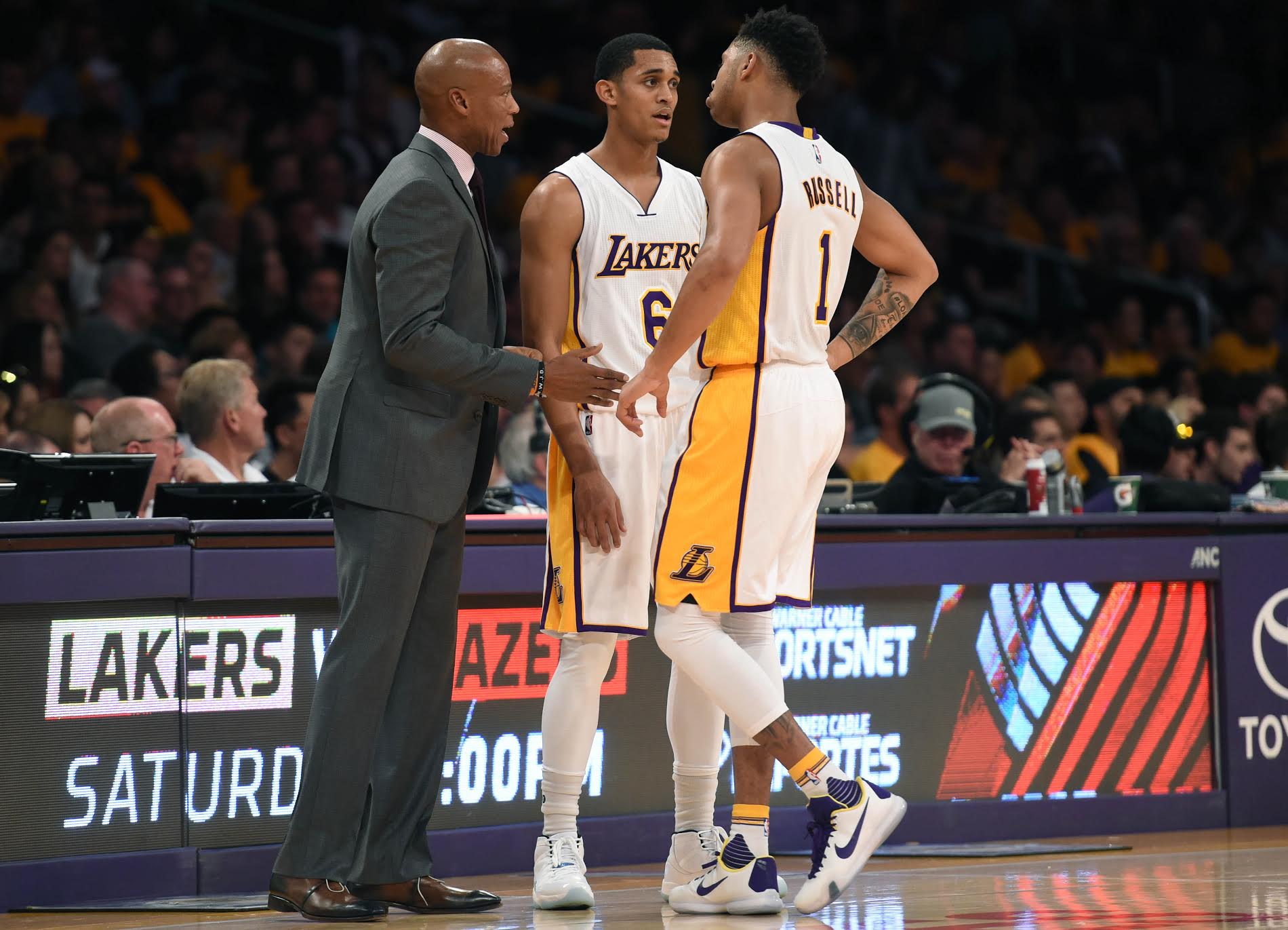 Los Angeles Lakers head coach Byron Scott  talks with Laker Jordan Clarkson,6, and D'Angelo Russell ,1, against Portland, during the second half at the Staples Center.  Los Angeles Calif., Sunday, November,22, 2015.         (Photo by Stephen Carr / Daily Breeze)