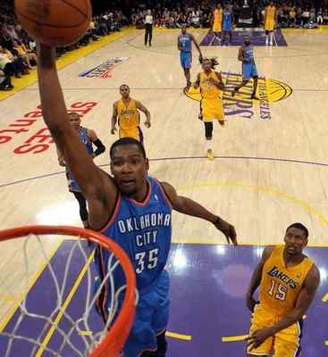 Oklahoma City Thunder star Kevin Durant will get an up-close chance to check out the young Lakers core today. Stephen Dunn — Getty Images