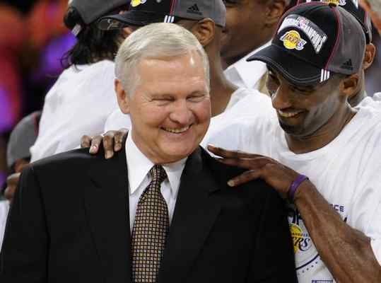 In this May 29, 2008 file photo, Los Angeles Lakers’ Kobe Bryant gives basketball great Jerry West a shoulder rub after the Lakers beat the San Antonio Spurs in Game 5 of the NBA Western Conference basketball finals in Los Angeles. When asked about the latest honor in a long series of enshrinements and accolades since West hung up his sneakers in 1974, the longtime Los Angeles Lakers guard and executive seemed to be anticipating his trip to Kansas City to be inducted into the National Collegiate Basketball Hall of Fame with something between cautious excitement and outright dread. AP FILE PHOTO