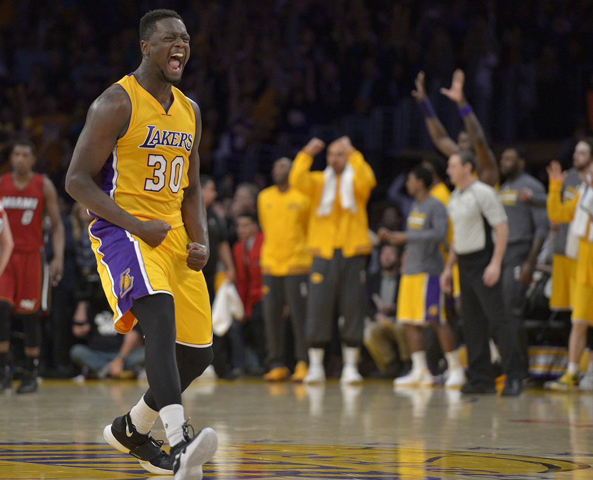 Los Angeles Lakers forward Julius Randle #30 celebrates the winning shot in OT. The Los Angeles Lakers defeated the Miami Heat 102-100 at Staples Center in Los Angeles, CA.  March 30, 2016.  (Photo by John McCoy/Los Angeles News Group)