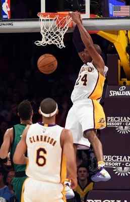 The Lakers’ Kobe Bryant dunks during the second quarter Sunday, April 3, 2016, against the Bosto becomes even more serious in last game vs. Celticsn Celtics at Staples Center. The Celtics beat the Lakers 107-100. (Photo by Stephen Carr/Daily Breeze) 