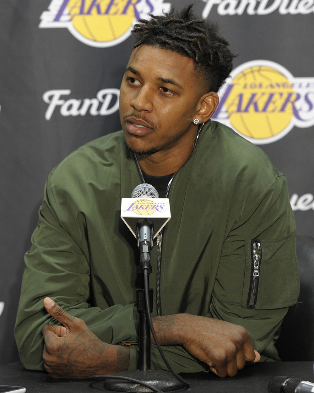 Nick Young talks. D'Angelo Russell and Nick Young held press conferences before the game. Russell shot a video on his phone of Young talking about cheating on his Fiance Iggy Azelia. The Los Angeles Lakers played the Miami Heat at Staples Center in Los Angeles, CA.  March 30, 2016.  (Photo by John McCoy/Los Angeles News Group)