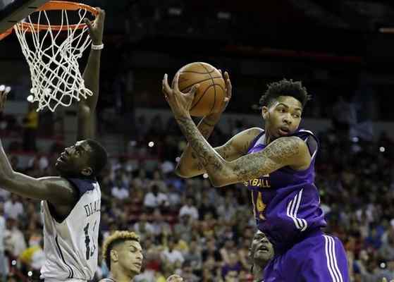 Los Angeles Lakers’ Brandon Ingram grabs a rebound over the New Orleans Pelicans during the first half of an NBA summer league basketball game Friday, July 8, 2016, in Las Vegas. (AP Photo/John Locher) 