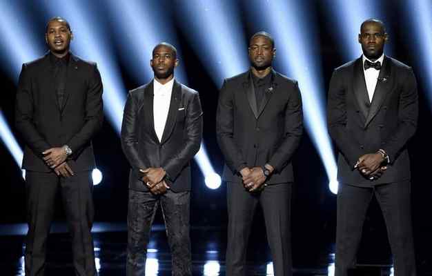 NBA basketball players Carmelo Anthony, from left, Chris Paul, Dwyane Wade and LeBron James speak on stage at the ESPY Awards at the Microsoft Theater on Wednesday, July 13, 2016, in Los Angeles. (Photo by Chris Pizzello/Invision/AP) 
