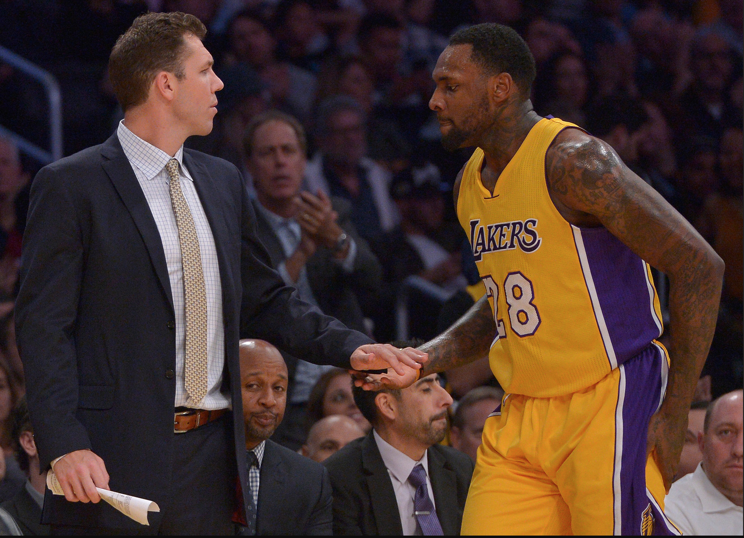 Los Angeles Lakers head coach Luke Walton shakes hands with Los Angeles Lakers center Tarik Black #28 in the 4th quarter. The Los Angeles Lakers defeated the Brooklyn Nets 125-118 at Staples Center in Los Angeles, CA 11/15/2016. Photo by John McCoy/Los Angeles Daily News (SCNG)