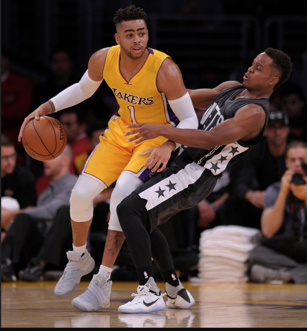 Los Angeles Lakers guard D'Angelo Russell #1 backs into Brooklyn Nets center Brook Lopez #11 in the first half. The Los Angeles Lakers played the Brooklyn Nets at Staples Center in Los Angeles, CA 11/15/2016. Photo by John McCoy/Los Angeles Daily News (SCNG)