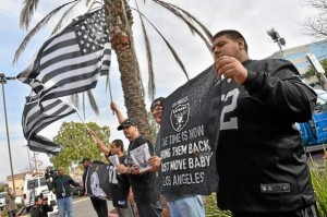 Raider fans showed up. Press conference in Carson to announce stadium proposal to lure 2NFL teams to the city. (Photo by Brad Graverson/The Daily Breeze)